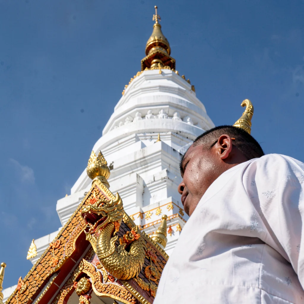 Lanna temple detail, Chiang Mai sacred ornament, white stupa against blue sky, g