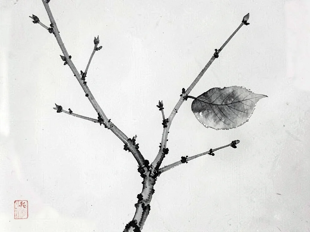 Bare branch with single remaining leaf