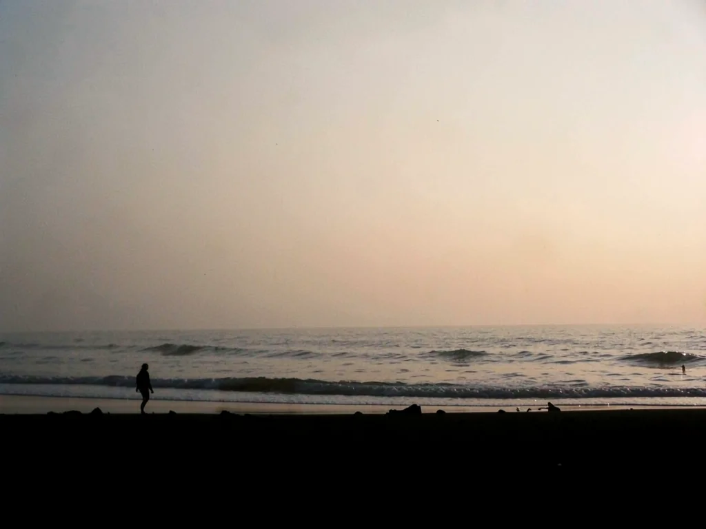 Beach silhouette with haze