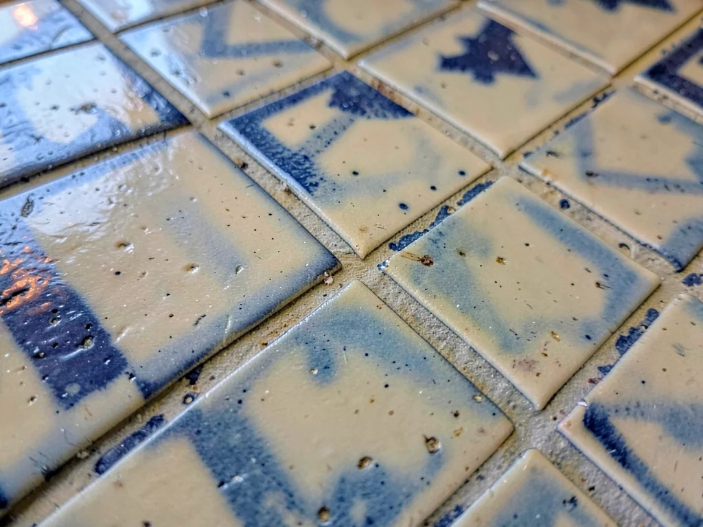 Tile grout lines creating secondary grid pattern